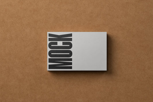 Business card mockup with white card and dark logo