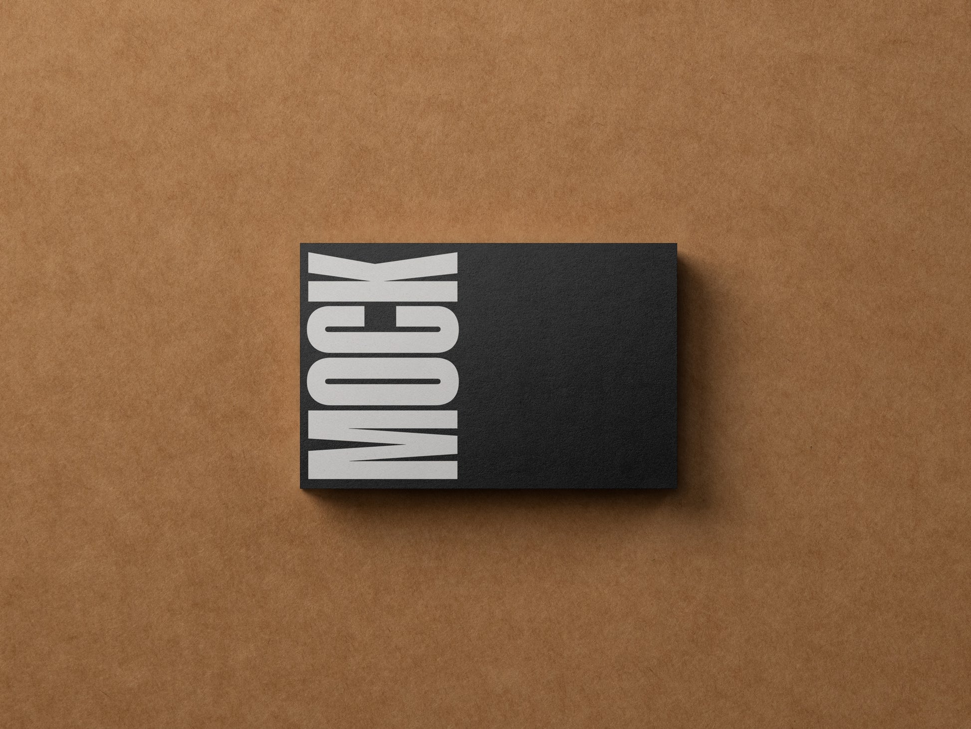 Black business card mockup with vertical MOCK lettering in gray and white
