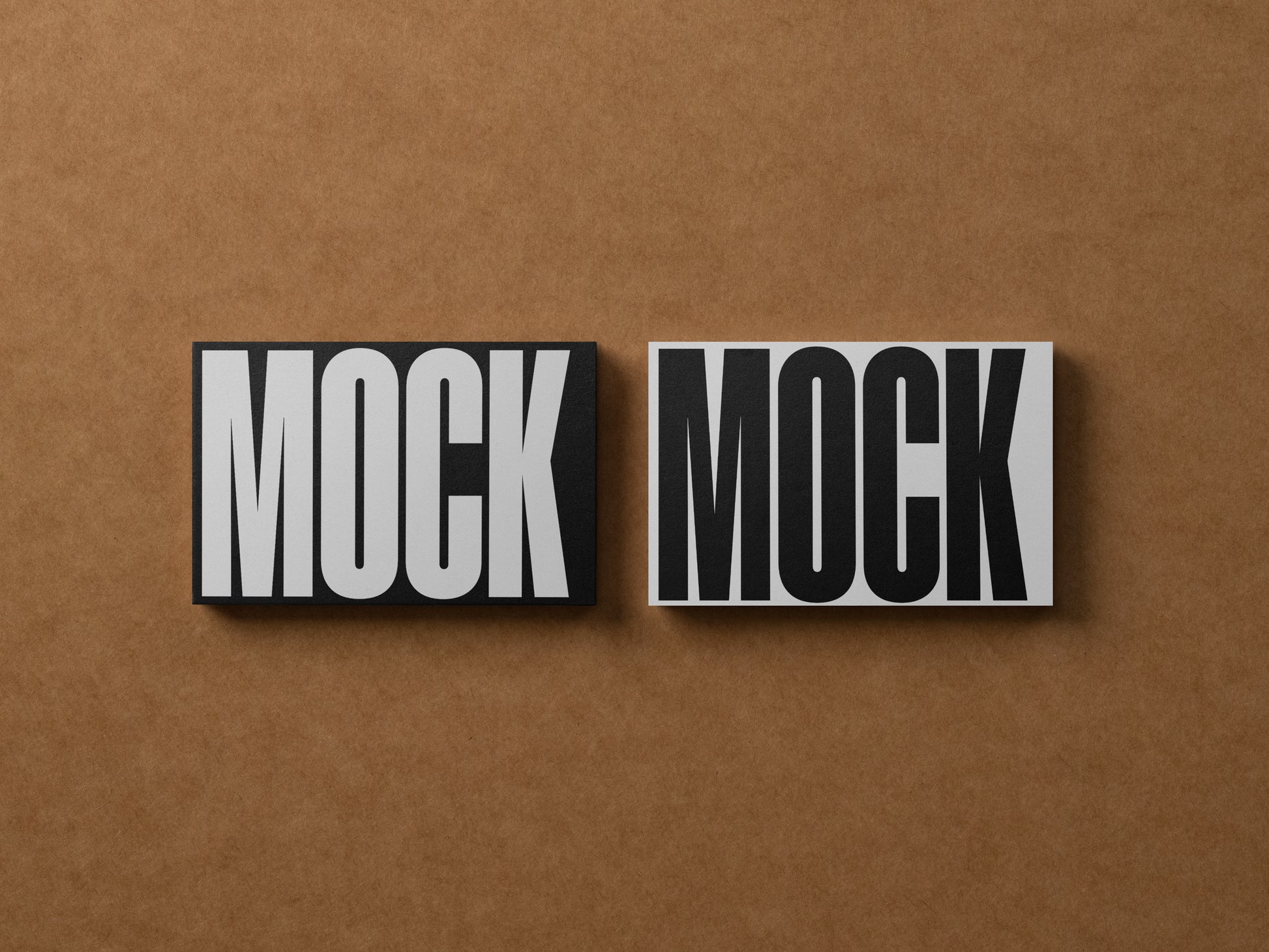 Business cards with 'MOCK' text, two side-by-side with dark gray letters