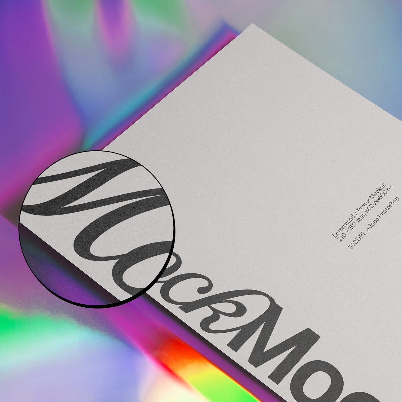 White stationery card mockup close-up showing circular zebra-style logo detail.