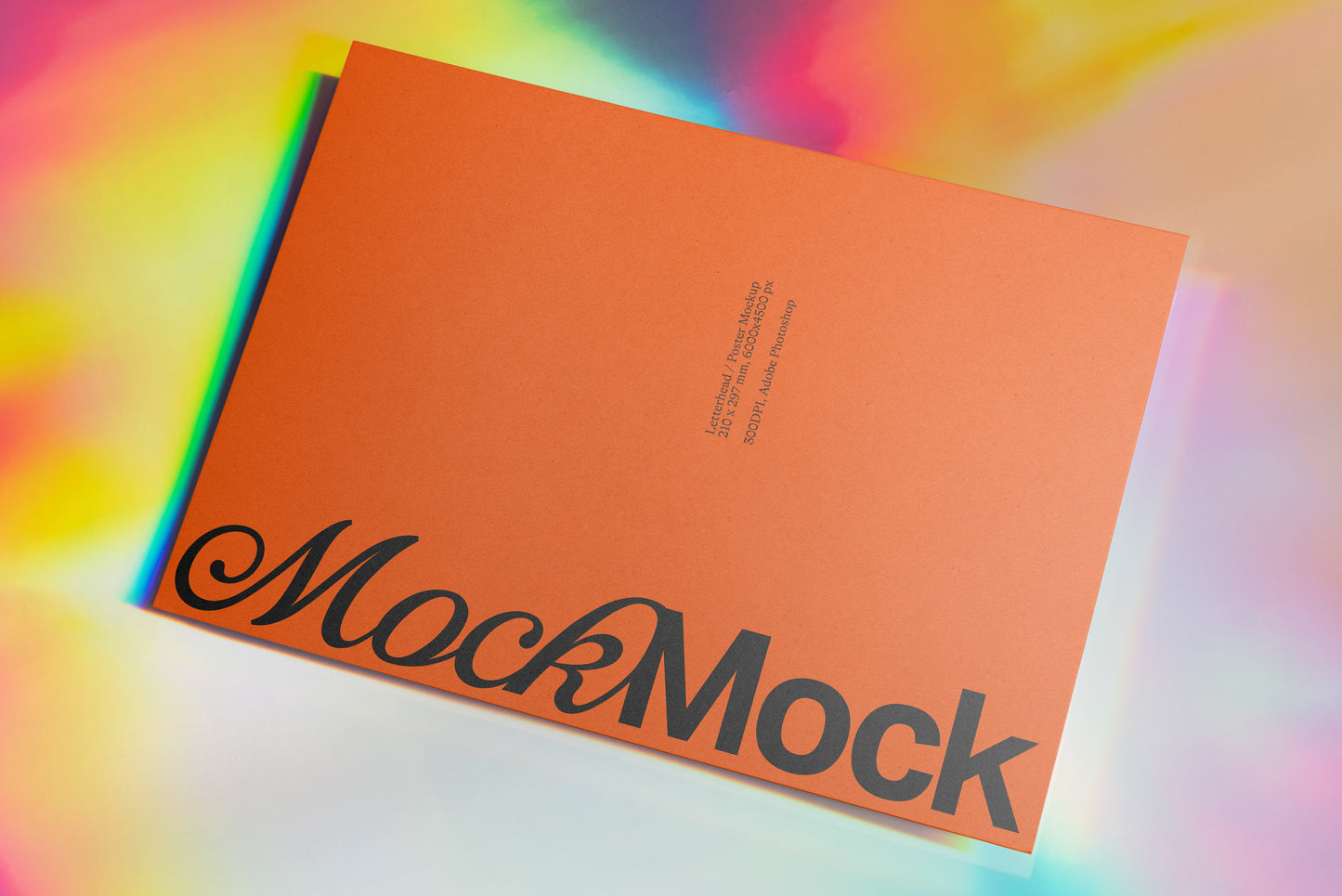 Orange stationery card mockup with MockMock text and small details on the front