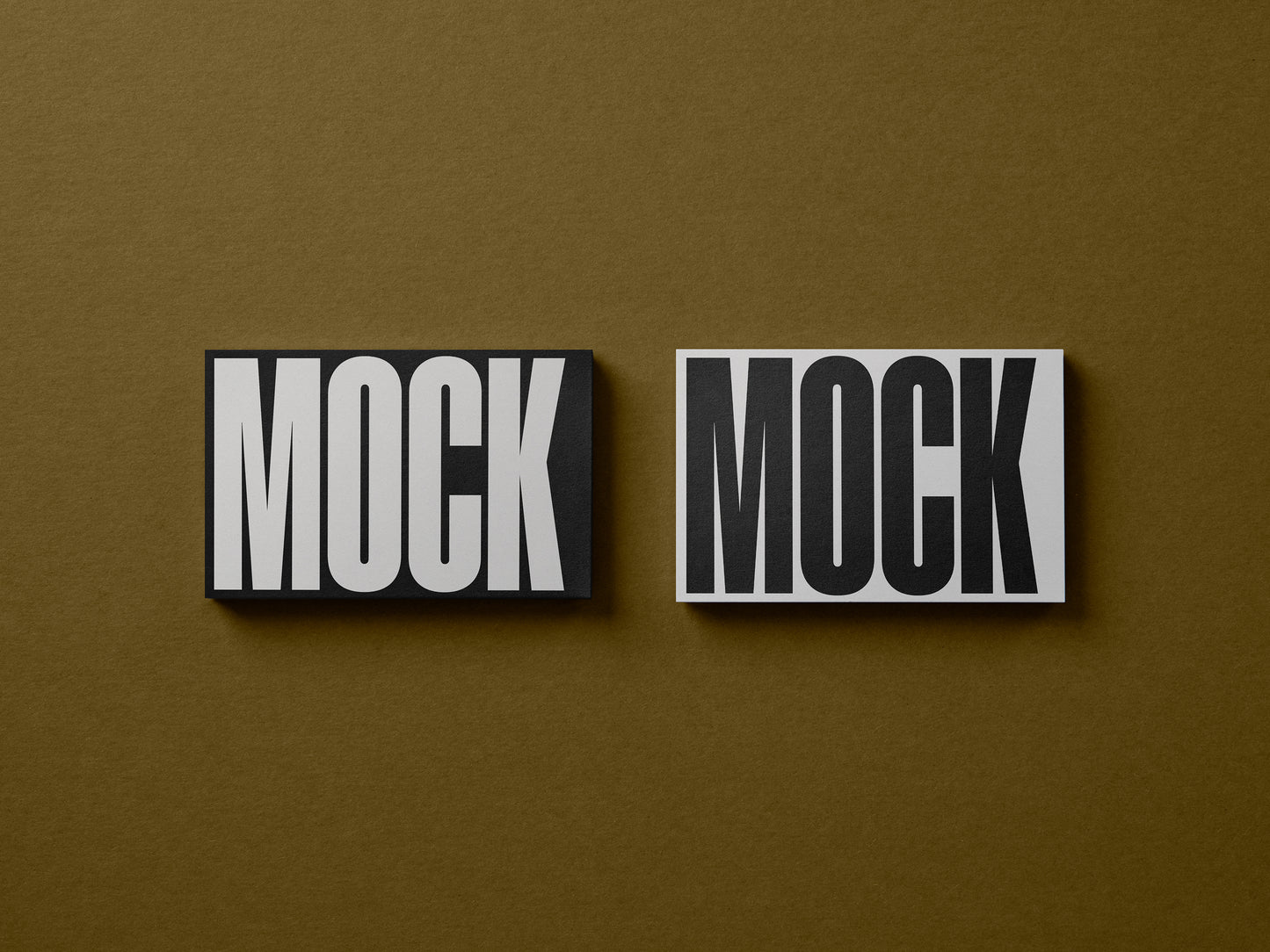 Two business cards mockup with 'MOCK' text and dark beveled edges