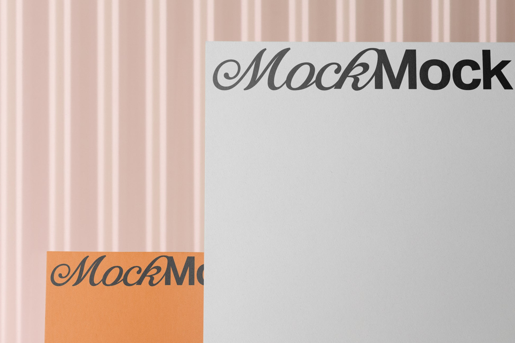 Letterhead mockup and square card mockup with visible 'MockMock' text