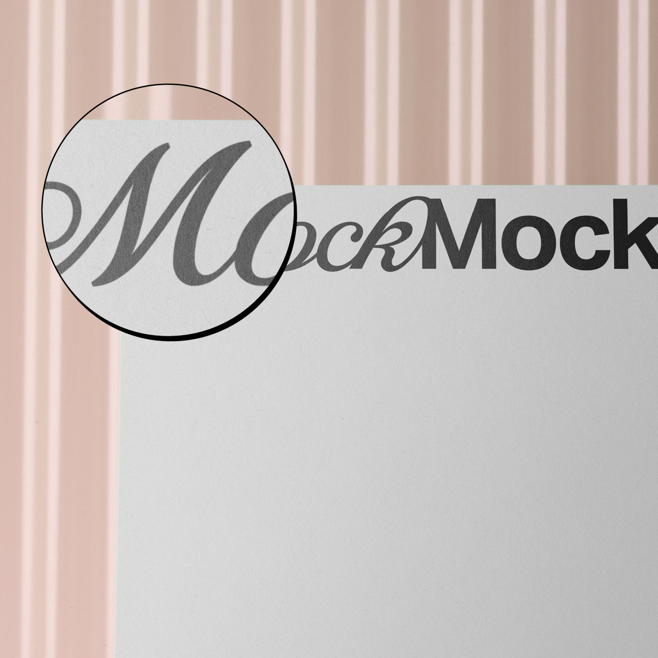 Business card mockup close-up showing MockMock logo and partial design